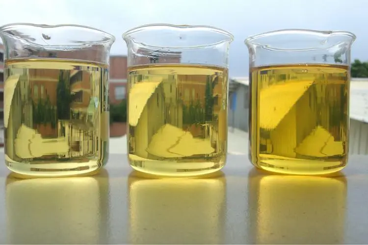 Three bottles of hydraulic fluid
